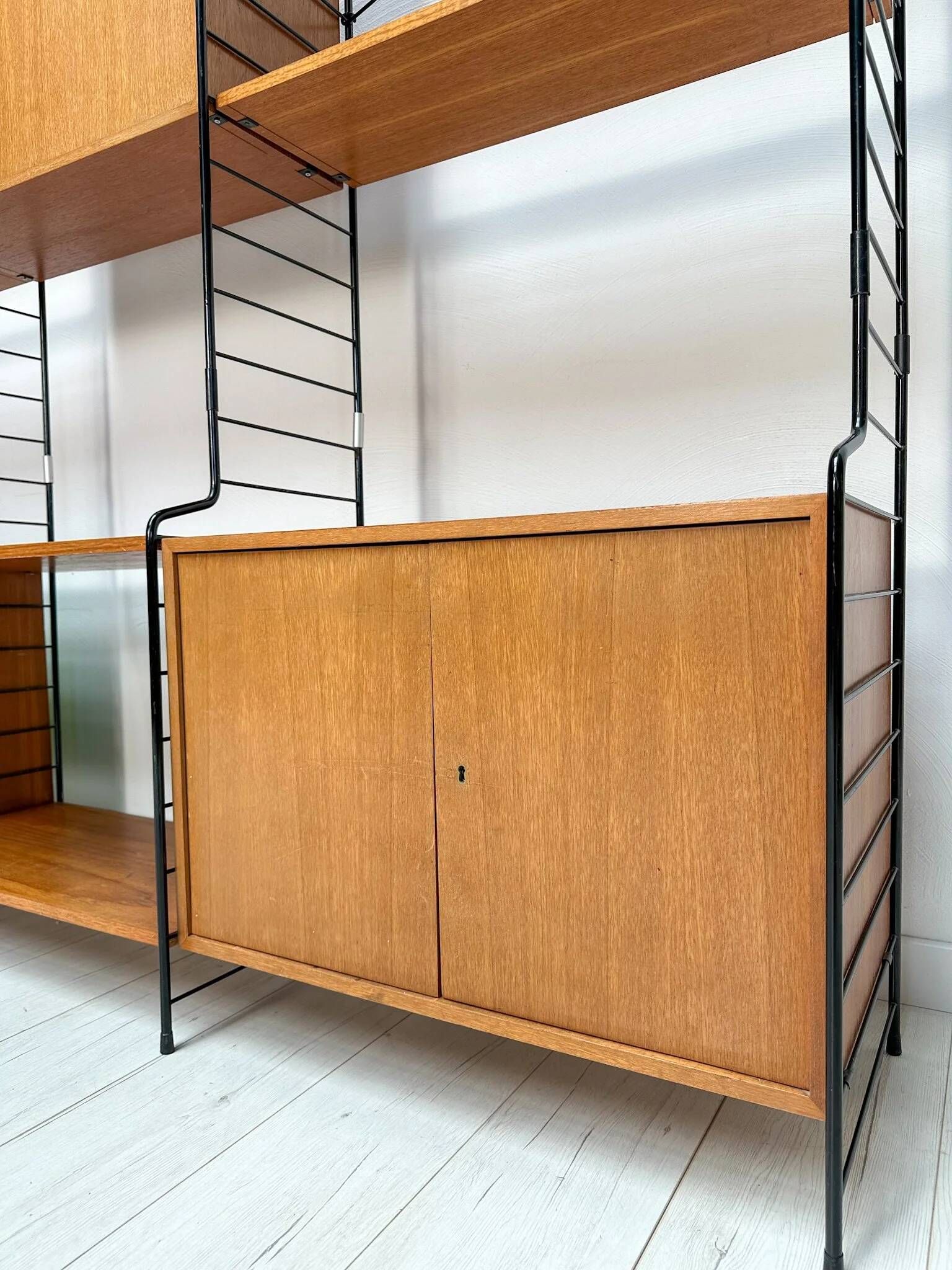 1960s vintage freestanding teak shelving system by WHB