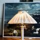 Vintage ivory ceramic lamp with gilding.