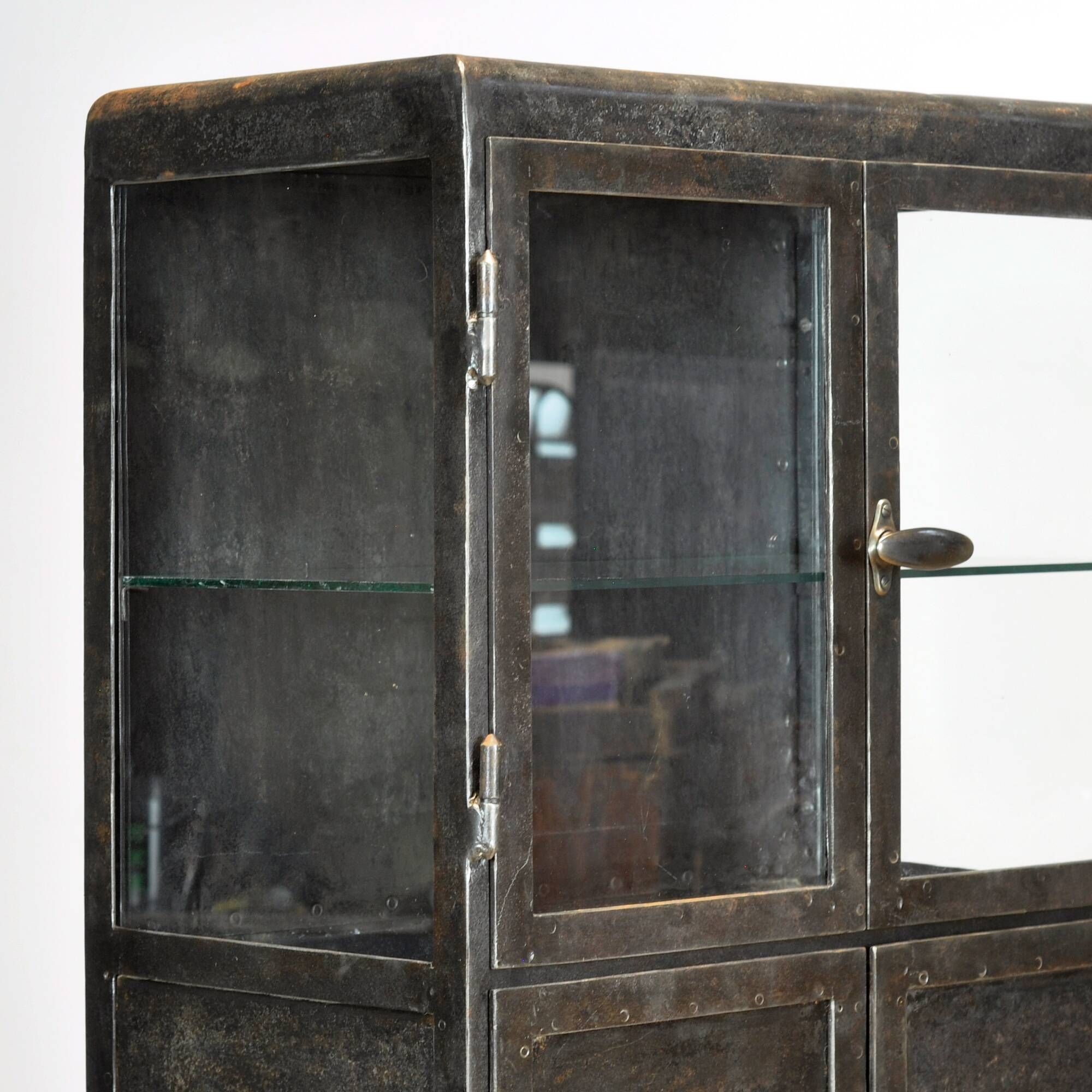 Antique industrial metal display cabinet, circa 1920