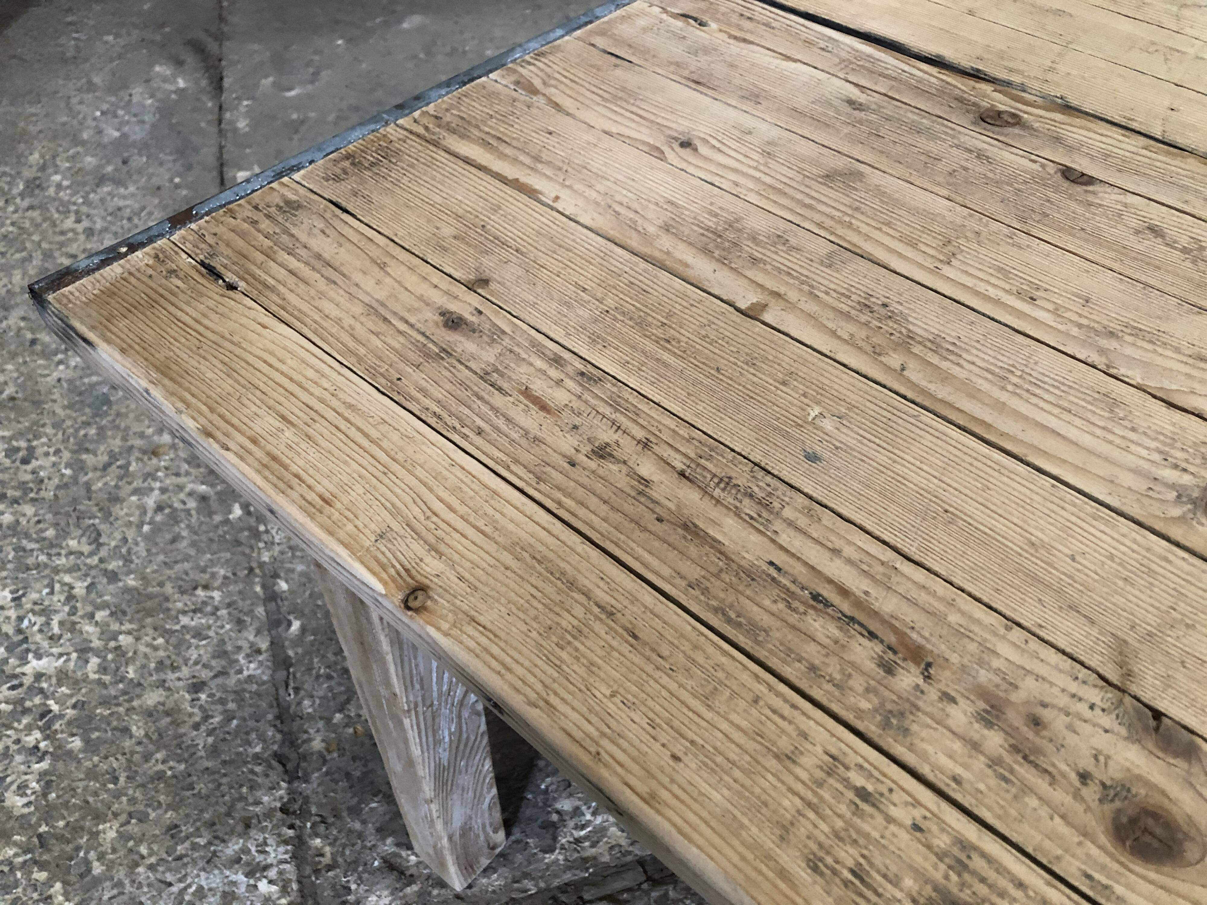 Washed-out wooden dining table