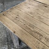 Washed-out wooden dining table