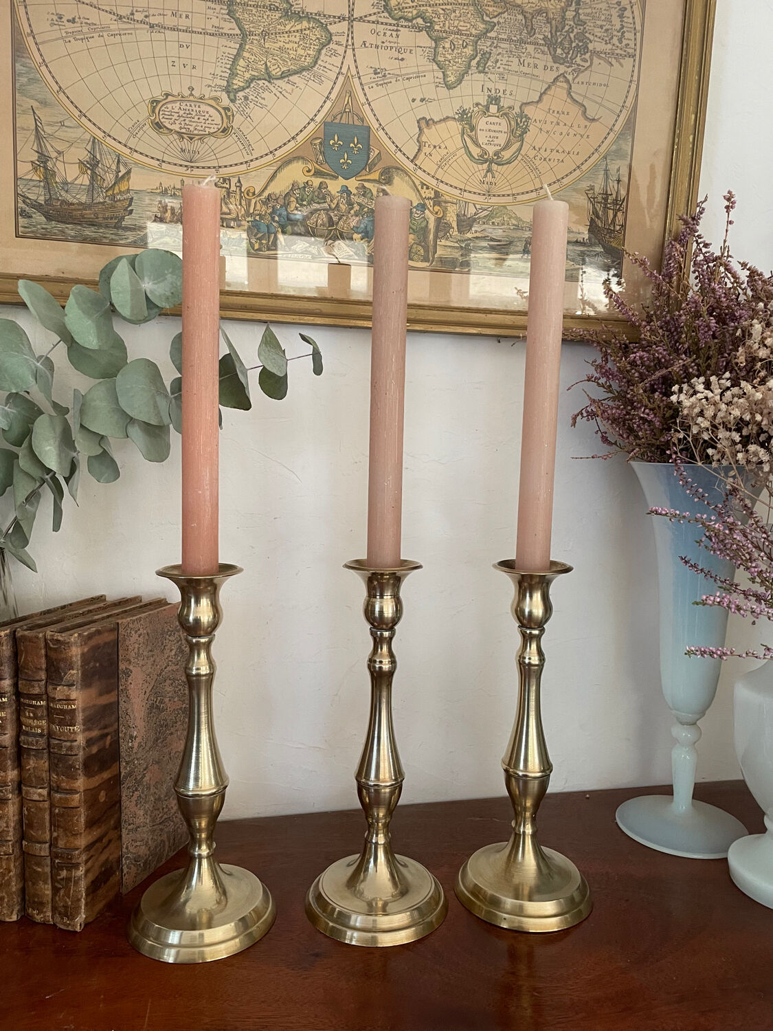 Set of three vintage brass candlesticks