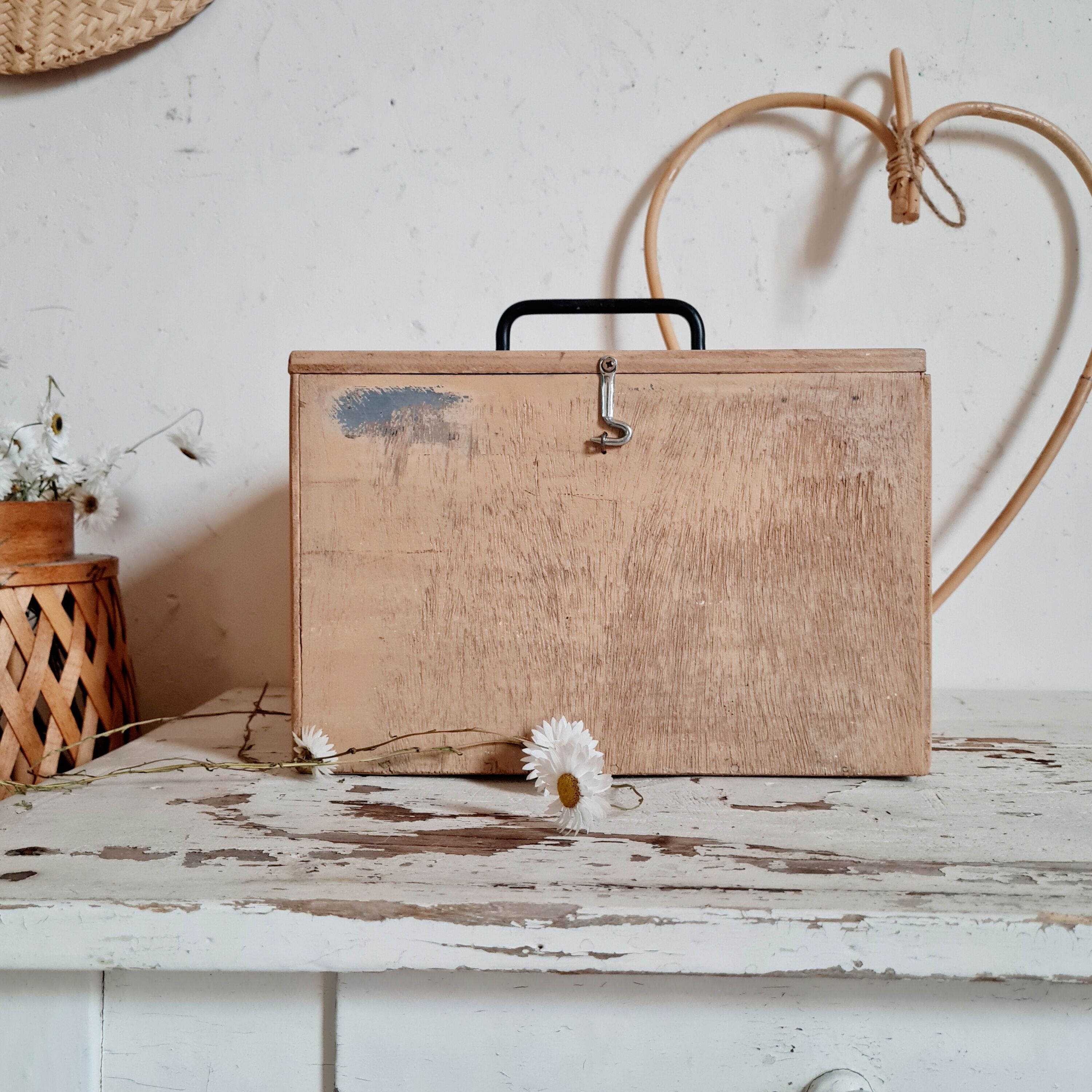 Small trunk in old wooden chest