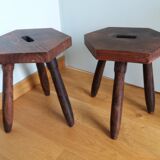 2 wooden tripod stools