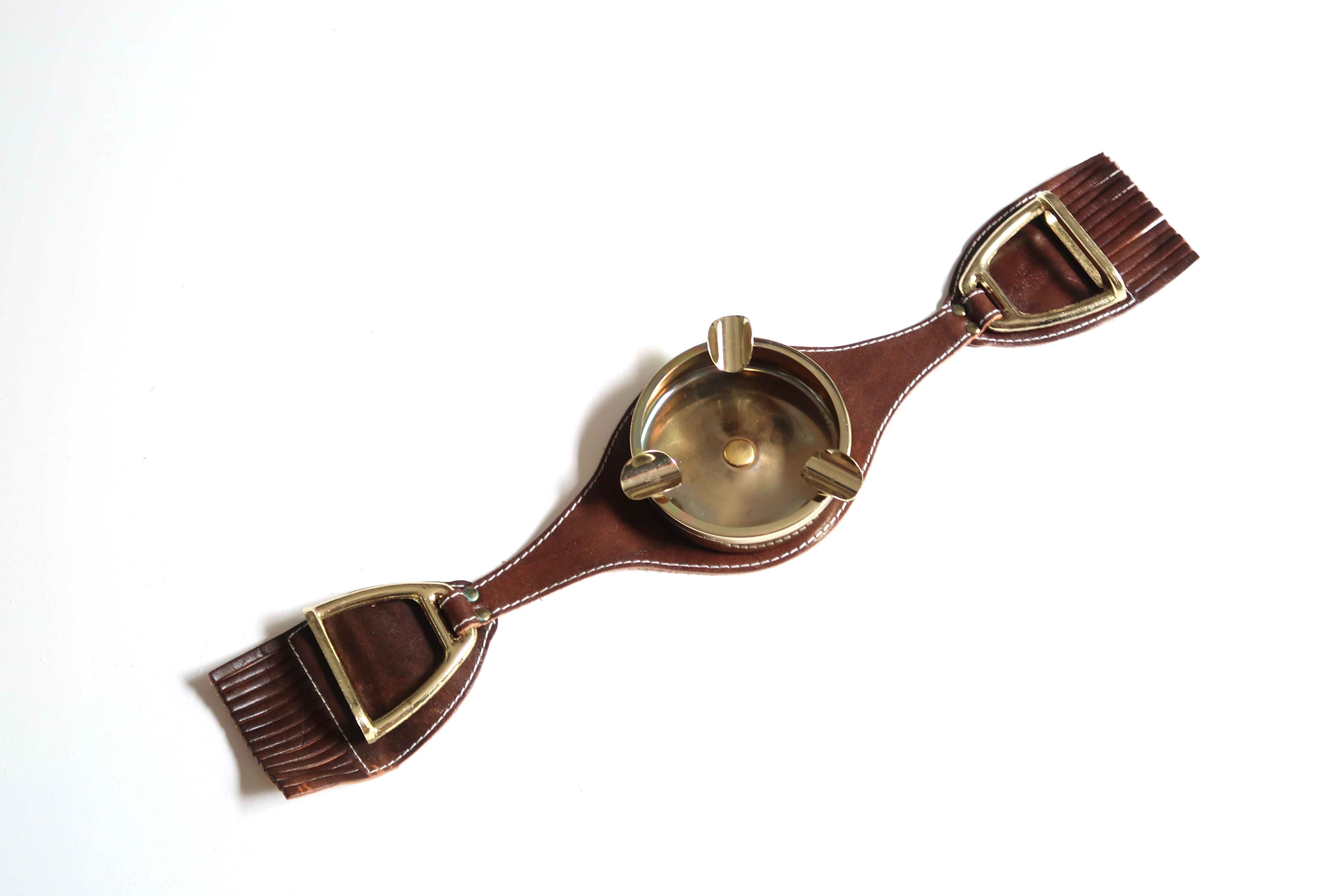 Armrest ashtray with stirrups, 50s