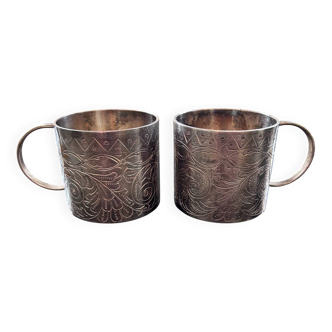 Pair of chiseled silver cups