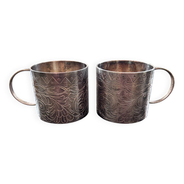 Pair of chiseled silver cups