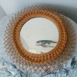Old vintage sun mirror in rattan braid 60 years