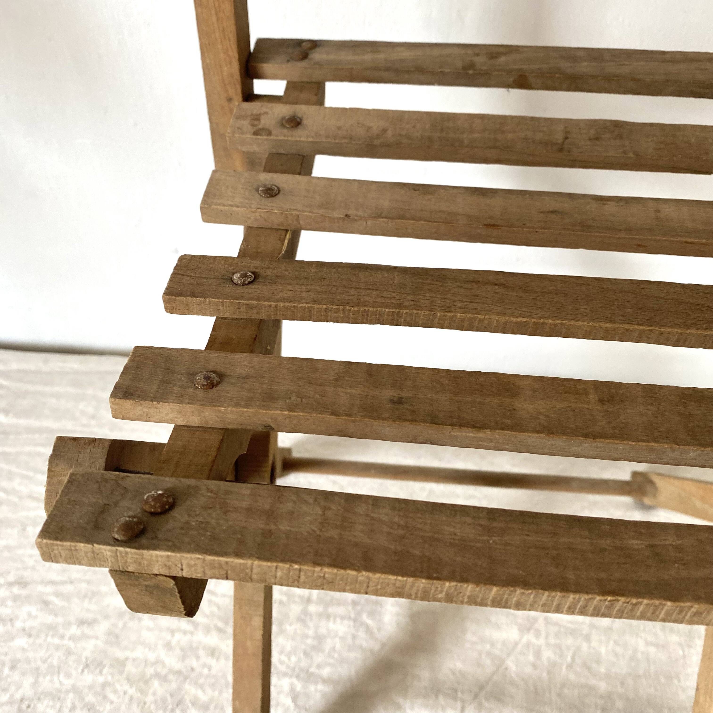 Antique folding chair or plant holder