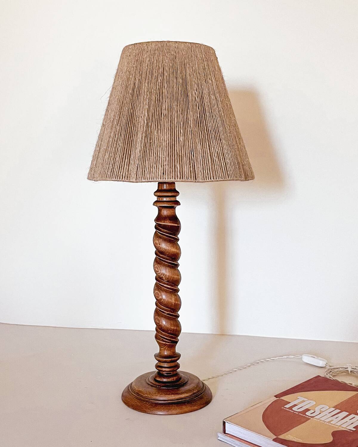 Turned wood lamp and jute lampshade