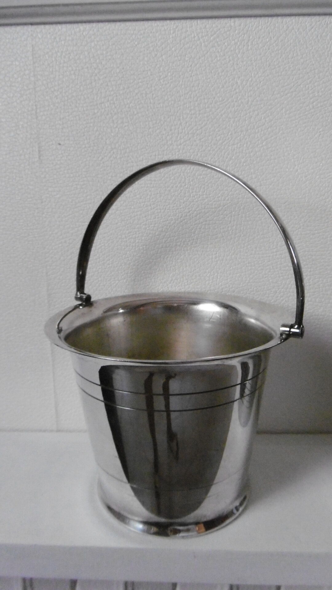 Silver metal shaker and ice bucket