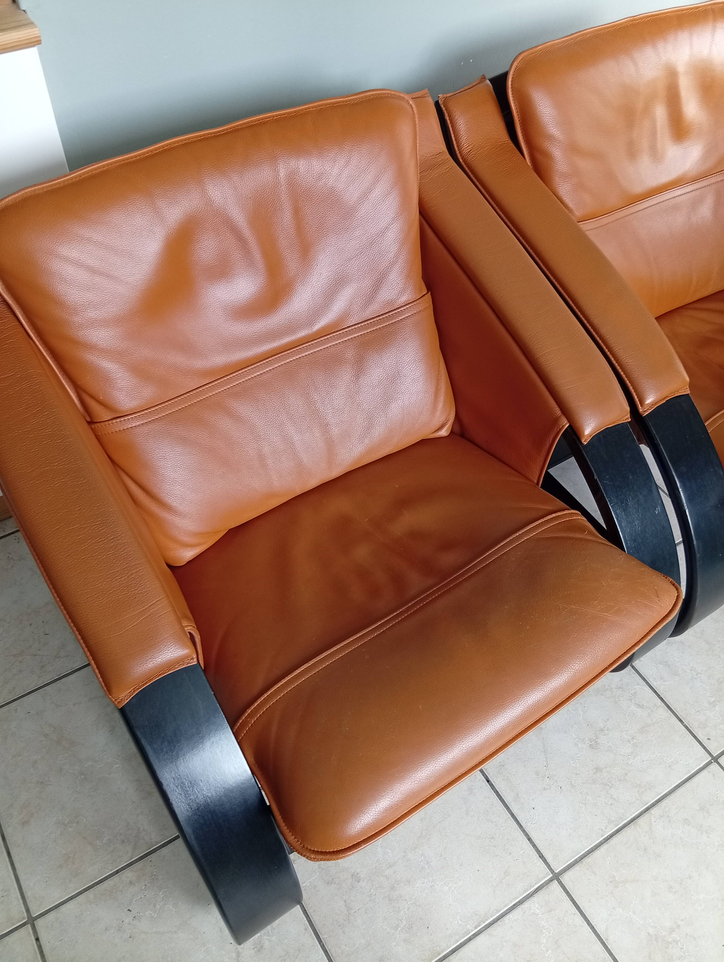 Pair of two black wooden armchairs in Scandinavian leather by Nelo Sweden, Roche Bobois