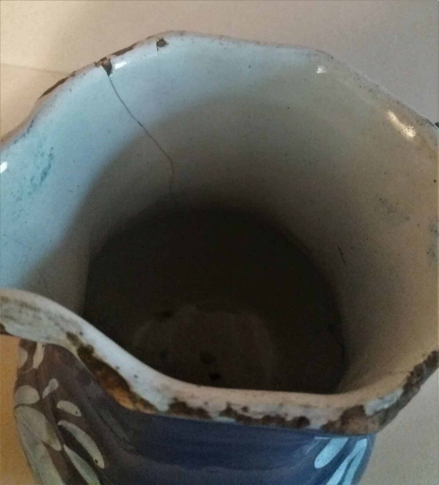East earthenware pitcher covered blue XIXth