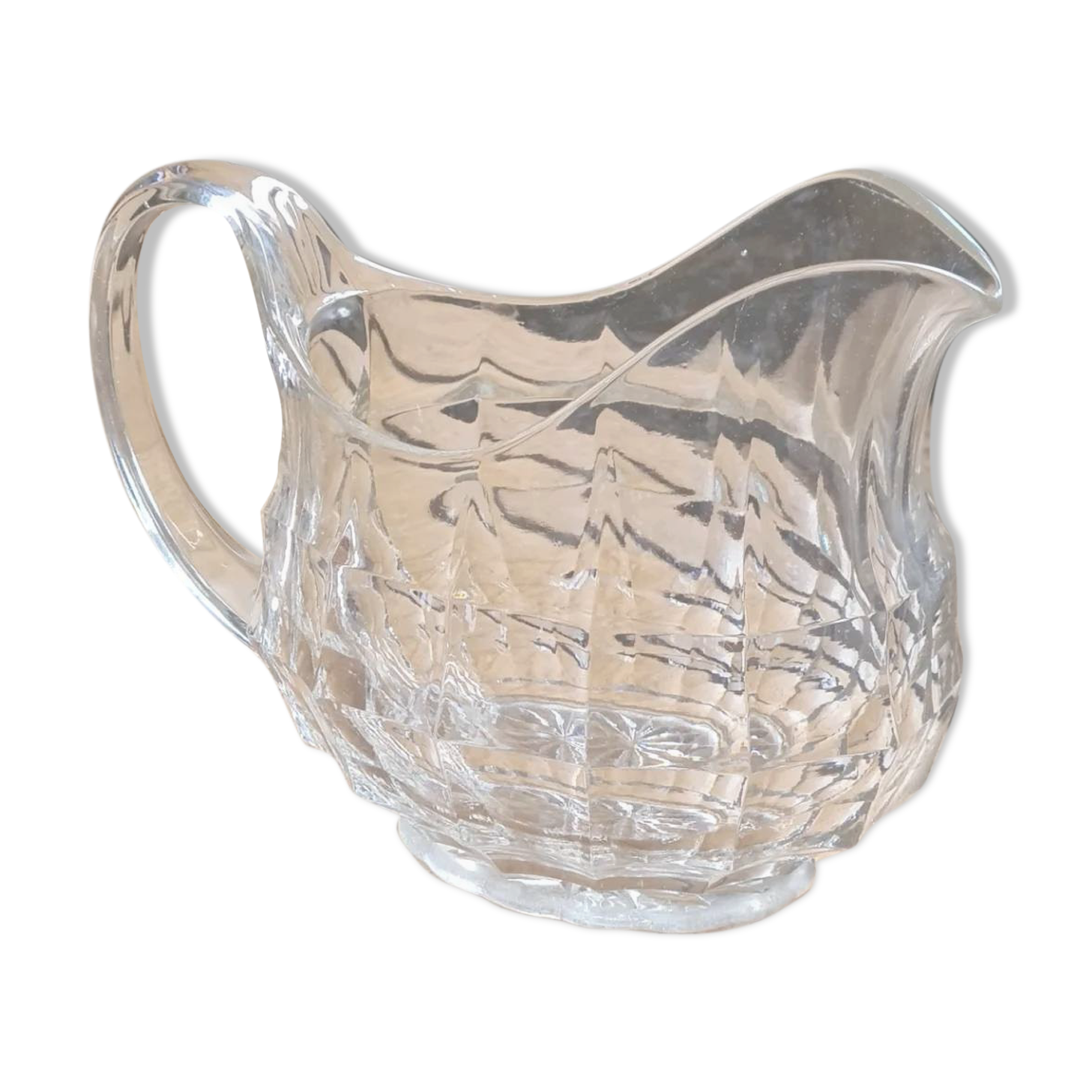 Faceted antique glass pitcher