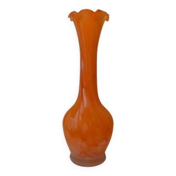 orange vase in glass paste