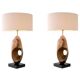 Pair of table lamps in patinated brass and black granite base.