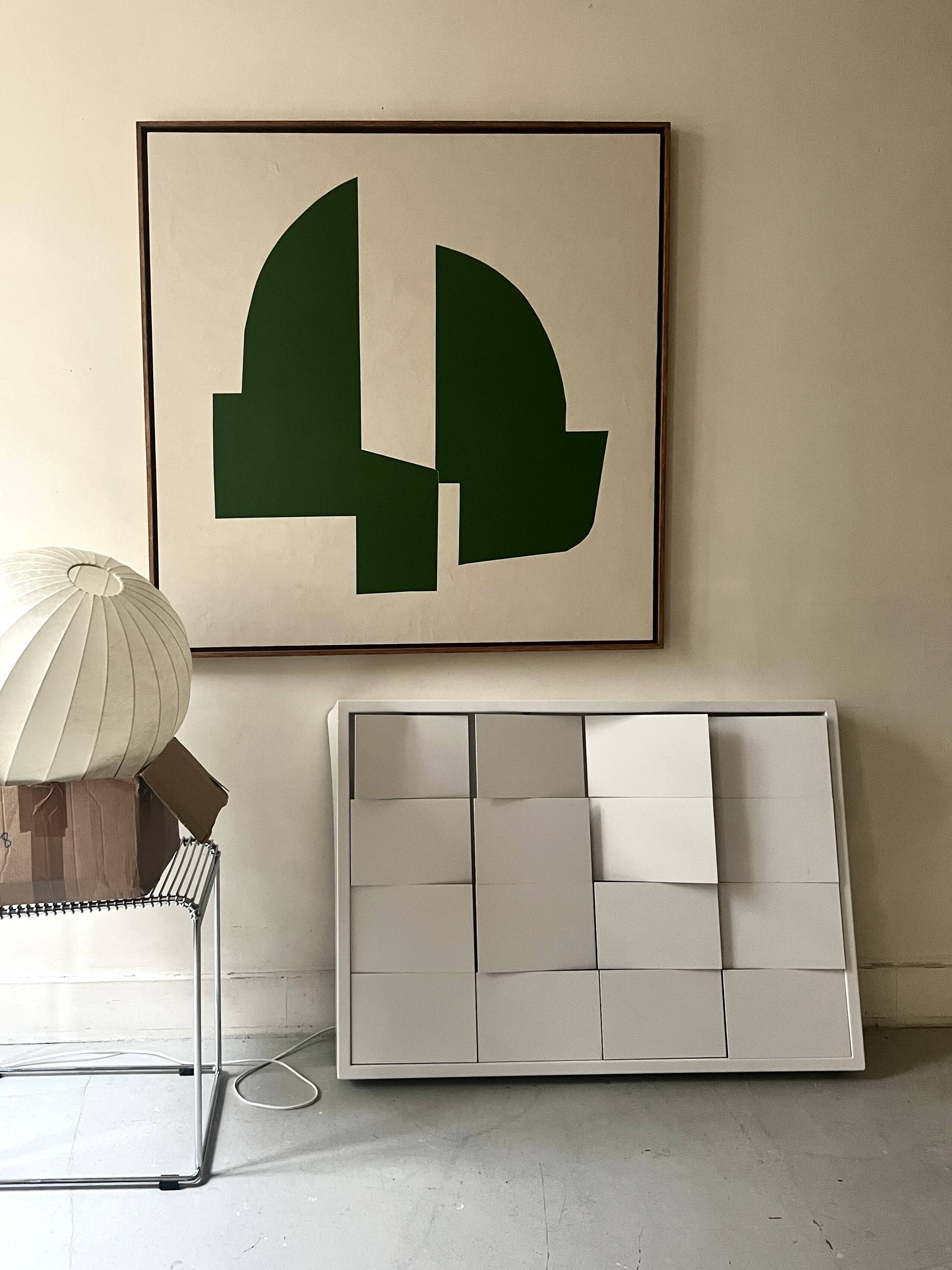 Modernist wall lamp with white metal shade, design by C. Grandidier.