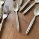 Set of silver-plated graphic cutlery for 6 people.