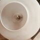 Suspension in opaline milk glass