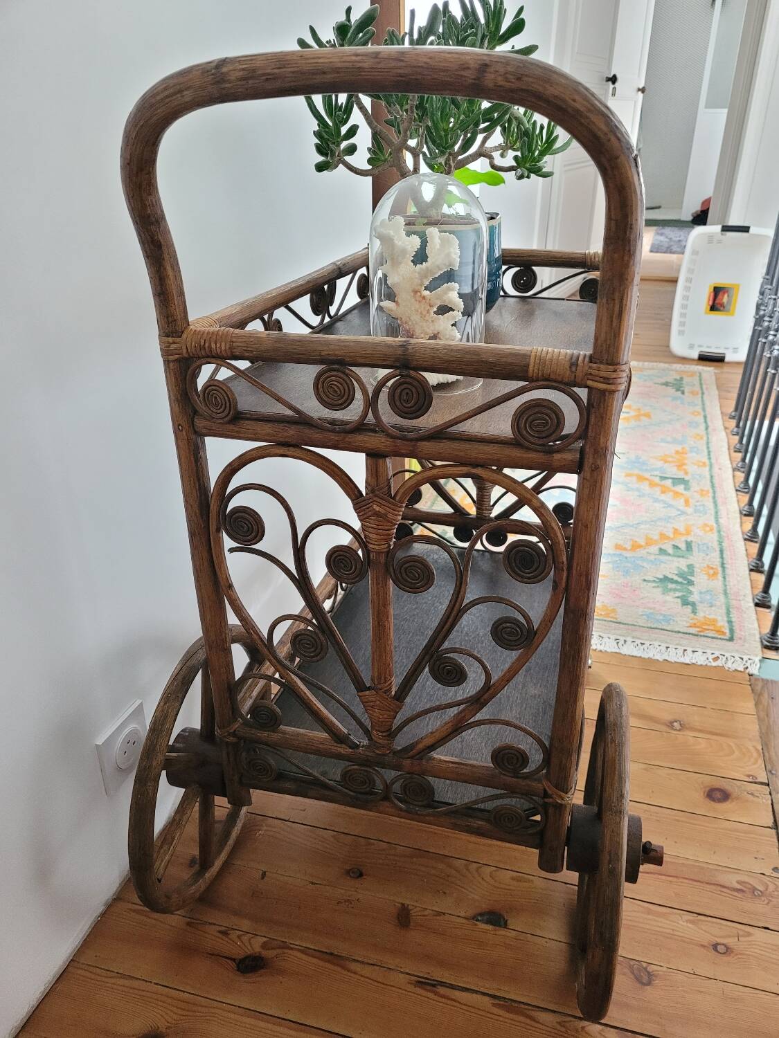 Bamboo and rattan dessert table in peacock style.