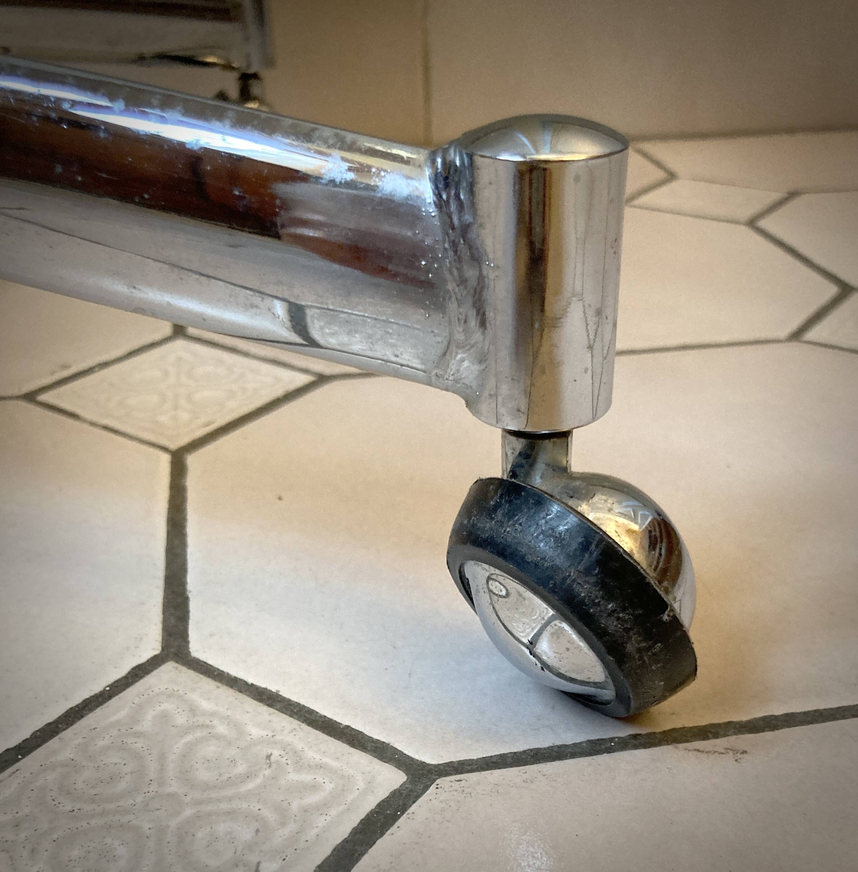 Side furniture with chrome wheels from the 60s