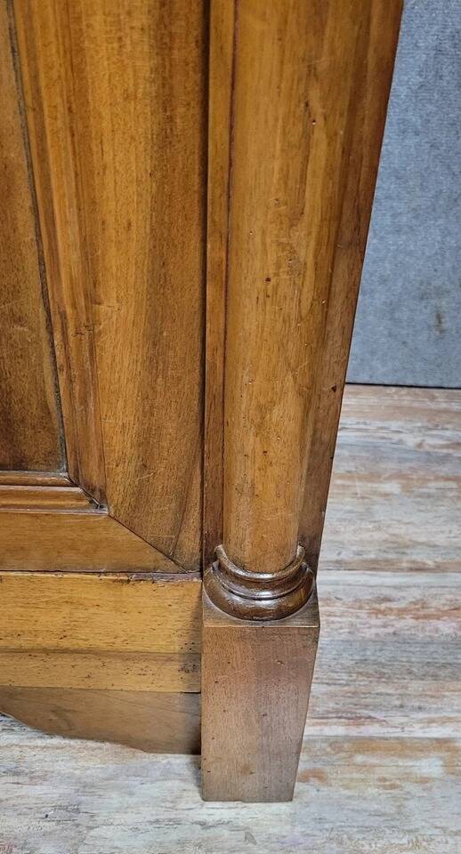 Exceptional Empire period wardrobe in solid walnut, 19th century, circa 1800