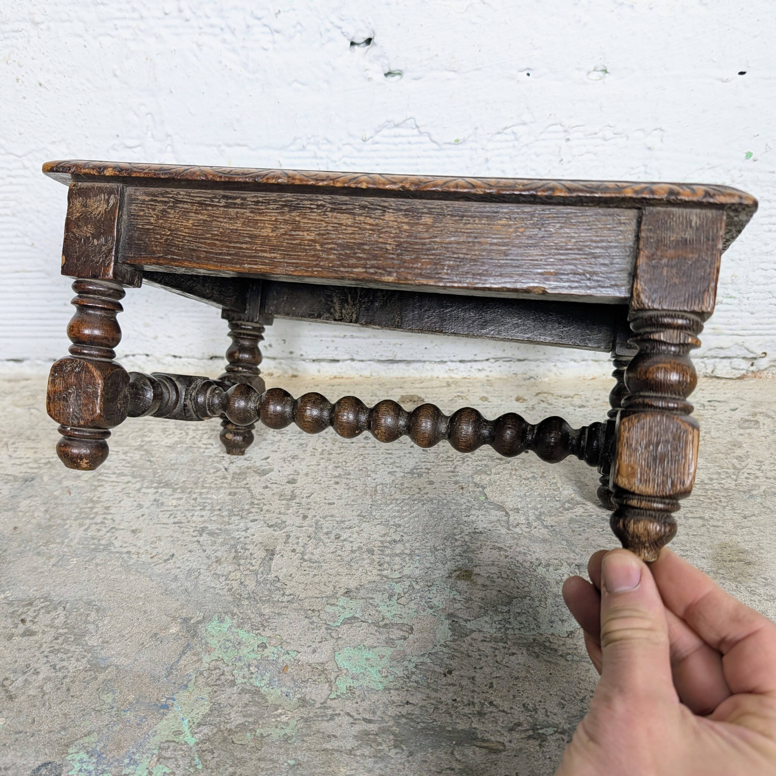 Carved wooden footrest