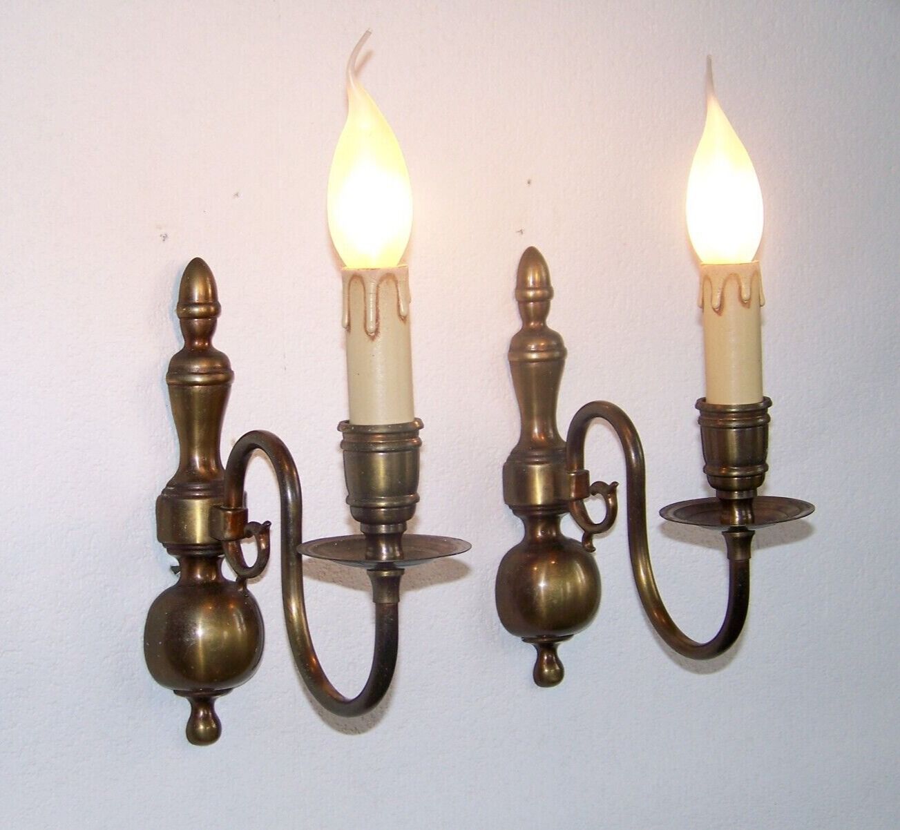 Pair of metal wall sconces