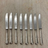 Set of 8 cheese knives in silver metal