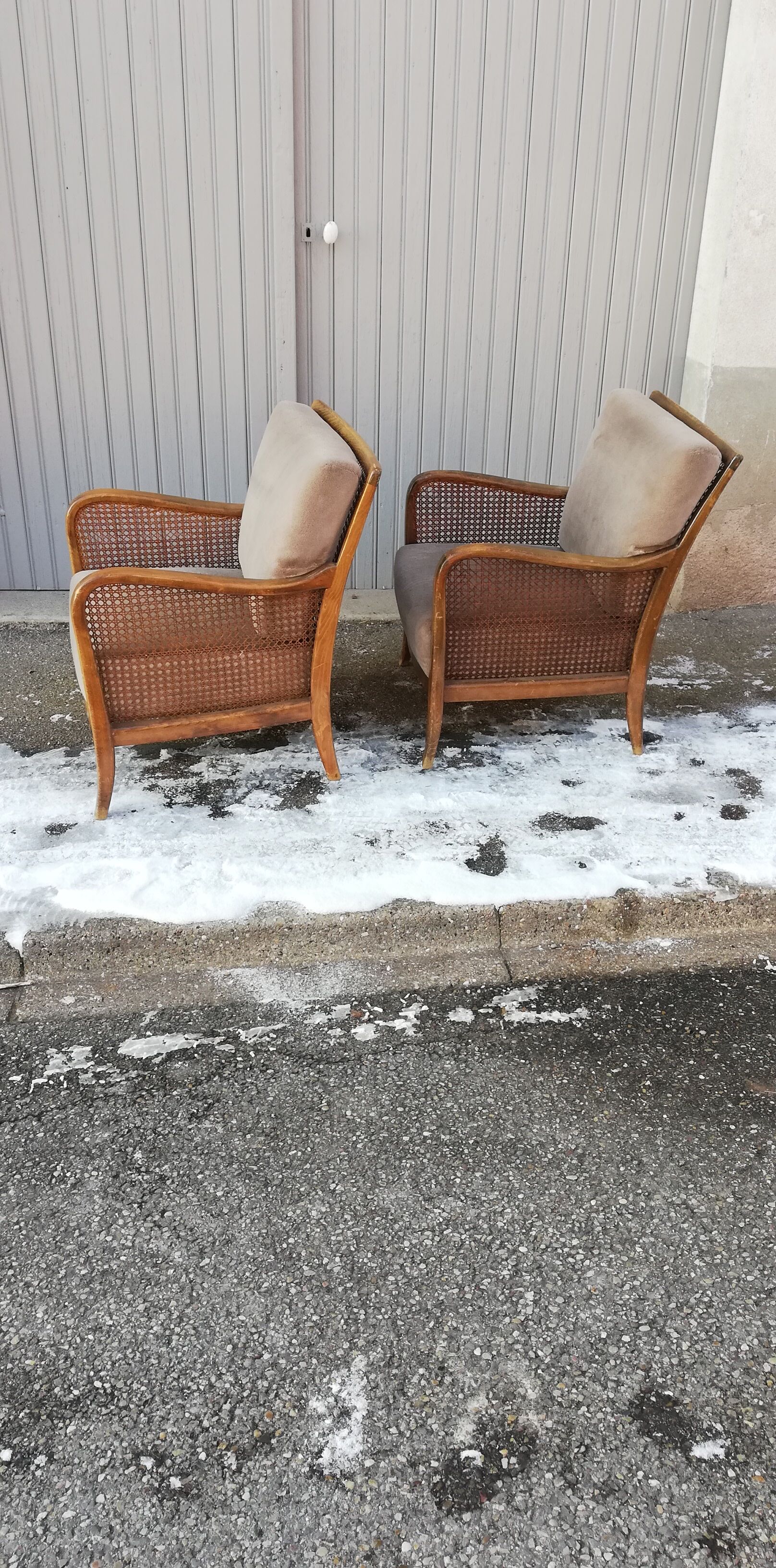 Pair of vintage cannage and fabric armchairs