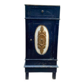 Italian Art Deco blue bedside table in painted wood, with a door, drawer, and sculpted gilded medallion.