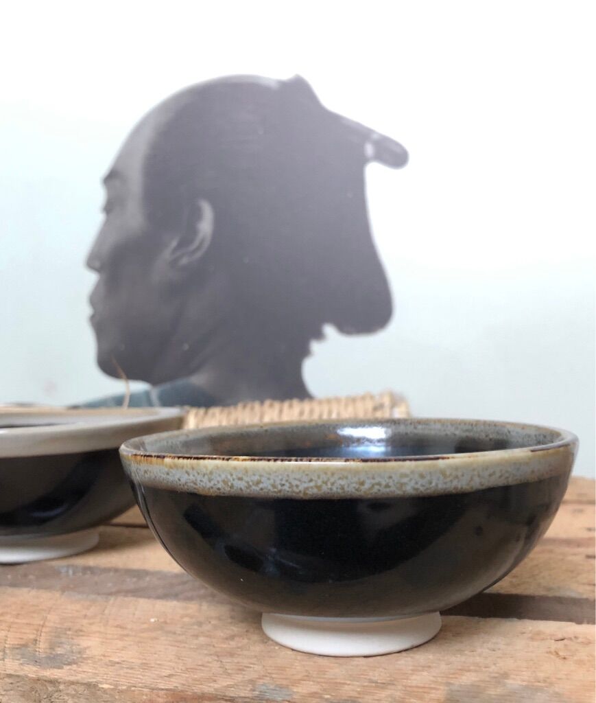 Lot of black ceramic-style bowls
