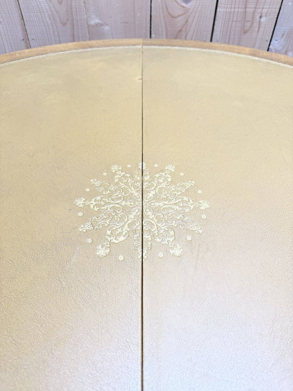 Round oak dining table with leather in Louis XV style.