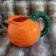 Jug / Carafe in orange barbotine shape