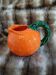 Jug / Carafe in orange barbotine shape