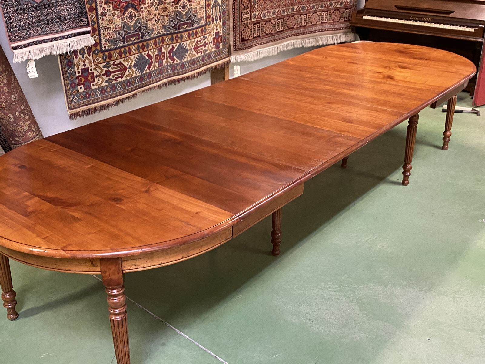 Louis Philippe round table 8 feet in cherry with 6 extensions