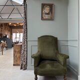 Green velvet tub chair