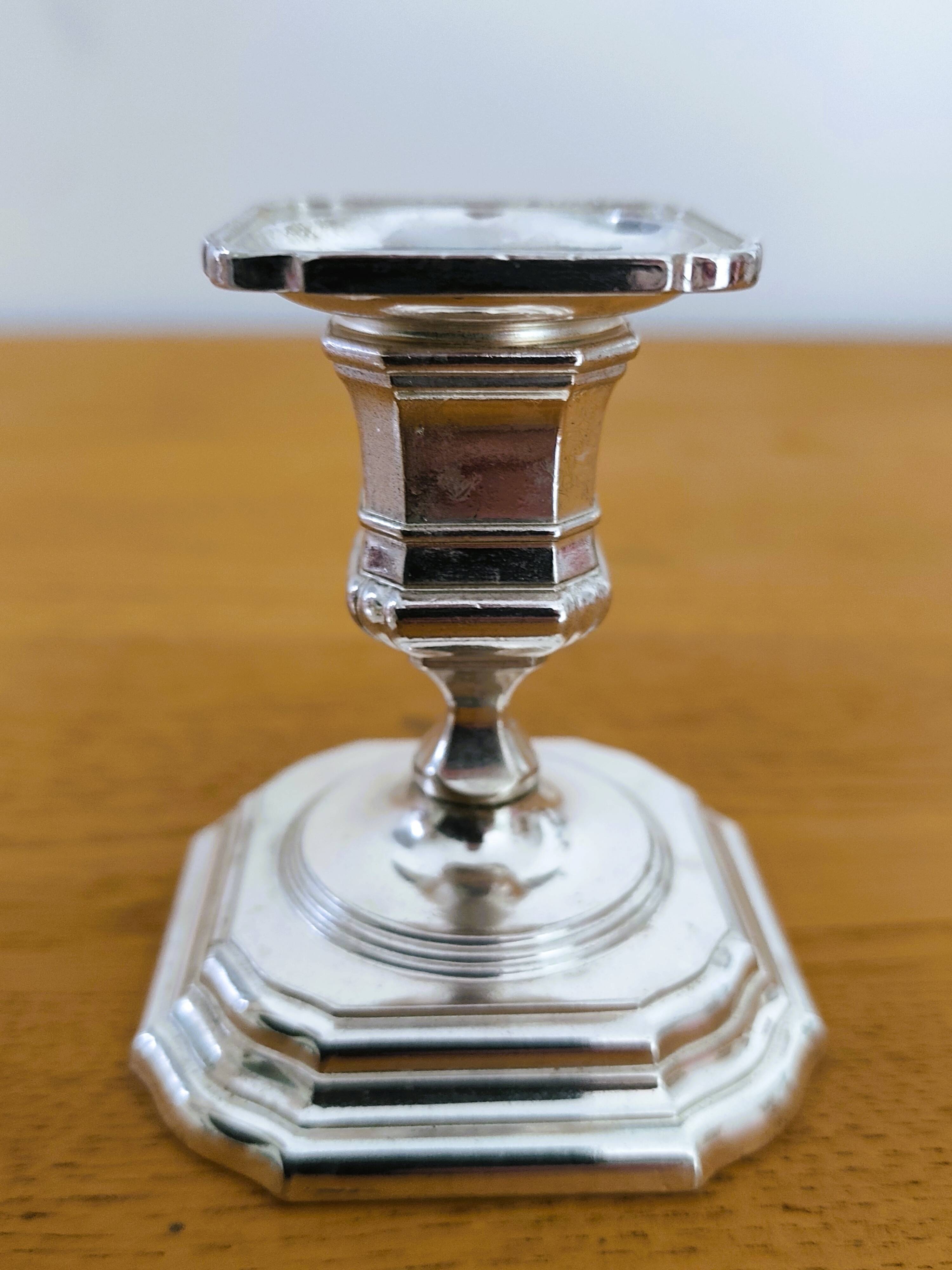 Pair of antique silver-plated candlesticks