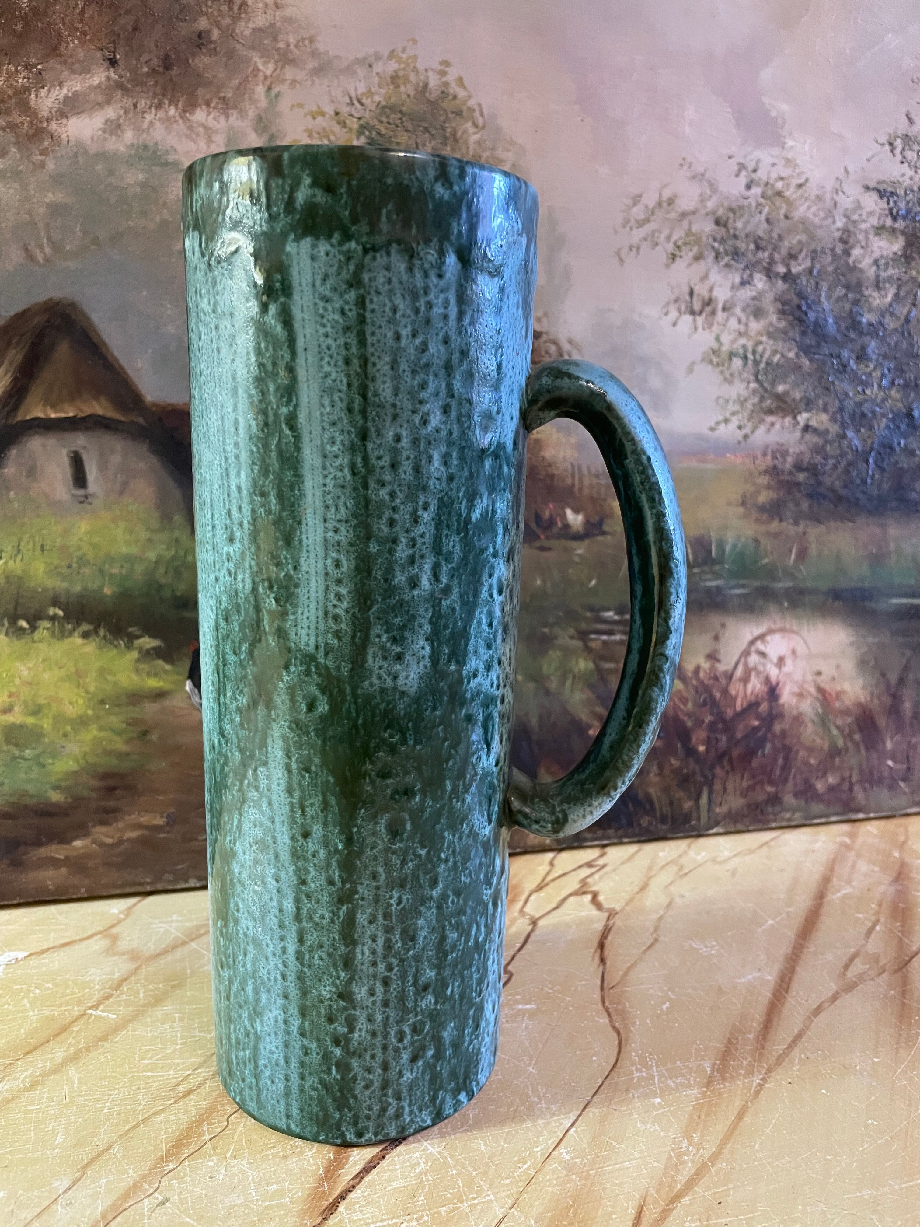 Blue ceramic pitcher