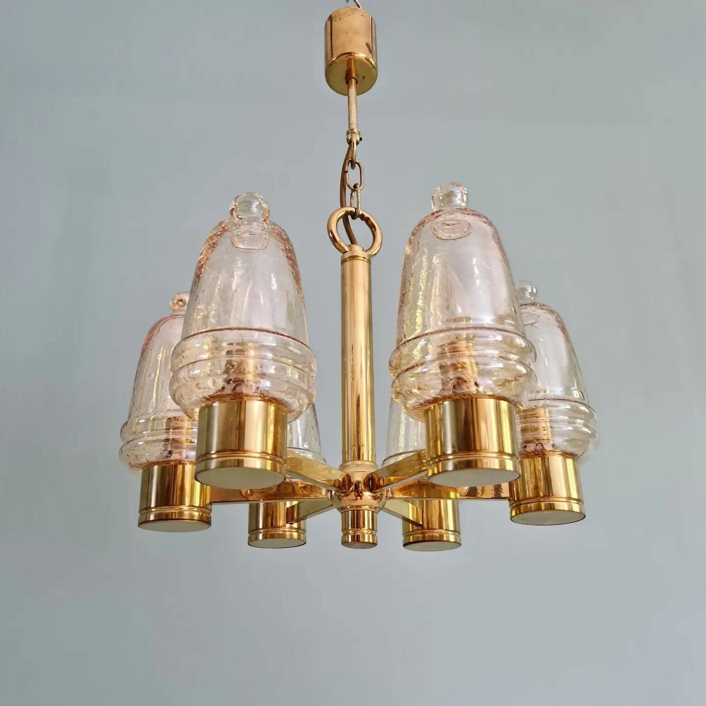 Brass chandelier with amber bubbled glass globes, 1970.