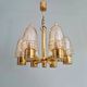 Brass chandelier with amber bubbled glass globes, 1970.