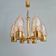 Brass chandelier with amber bubbled glass globes, 1970.