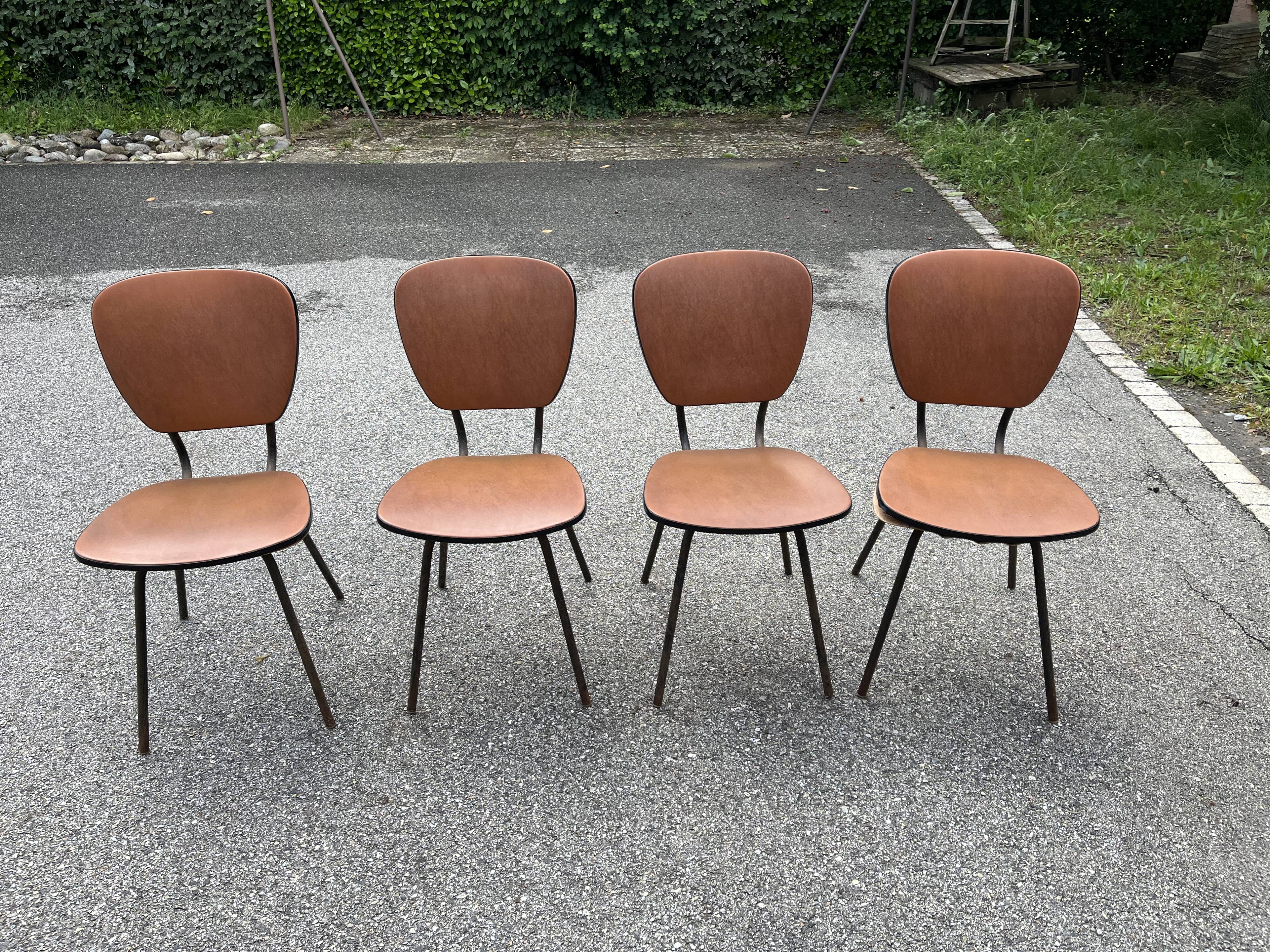 4 vintage brown faux leather chairs