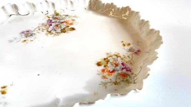 Old tray in floral pattern biscuit