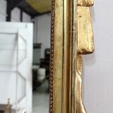 Miroir en bois doré, style Louis XVl, début XXe