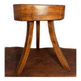Brutalist oak stool with curved legs, handcrafted