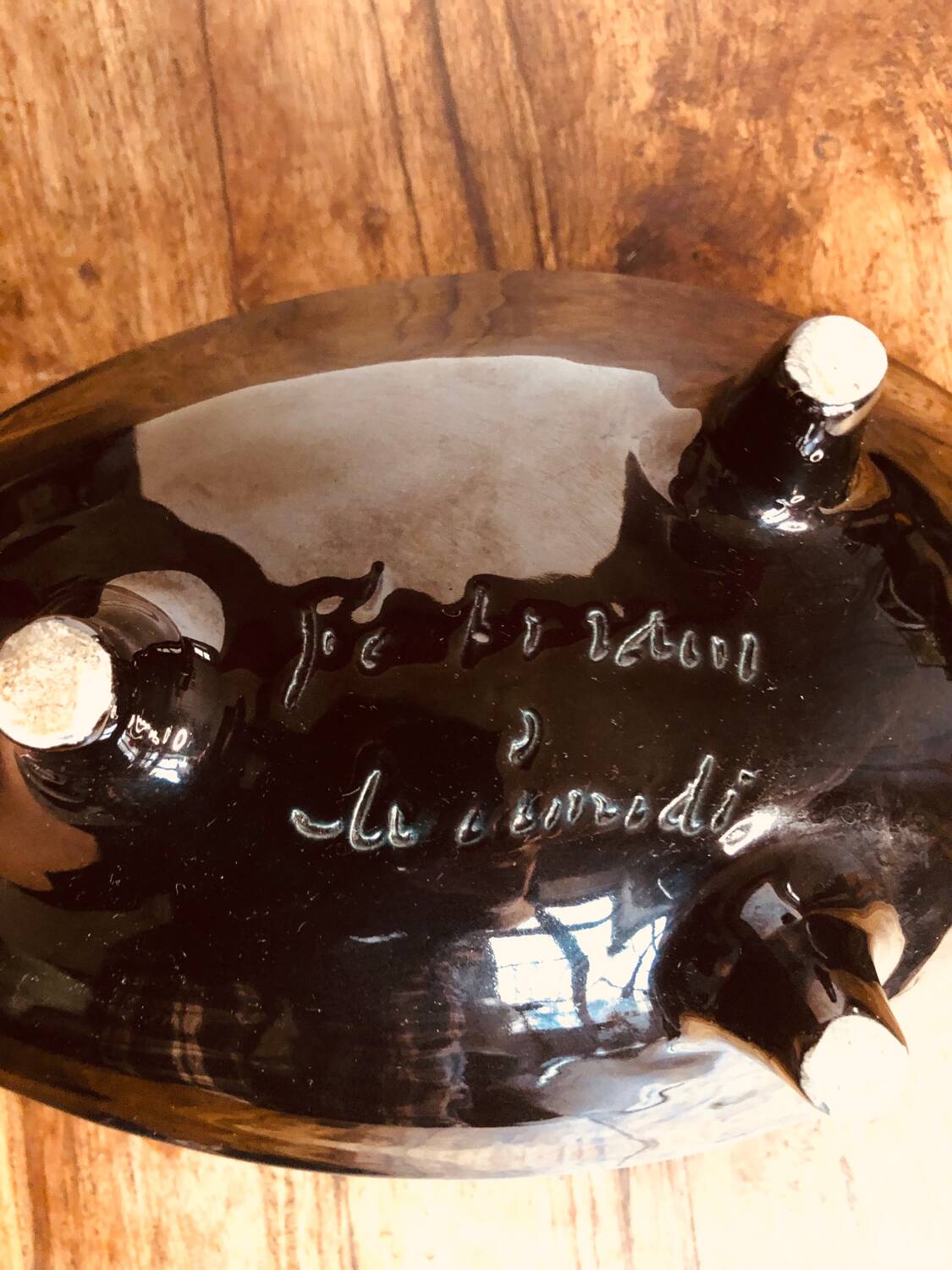 Large Céramidi tripod cup. Yellow and black. Signature incised Céramidi