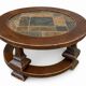 Round coffee table in stone and wood