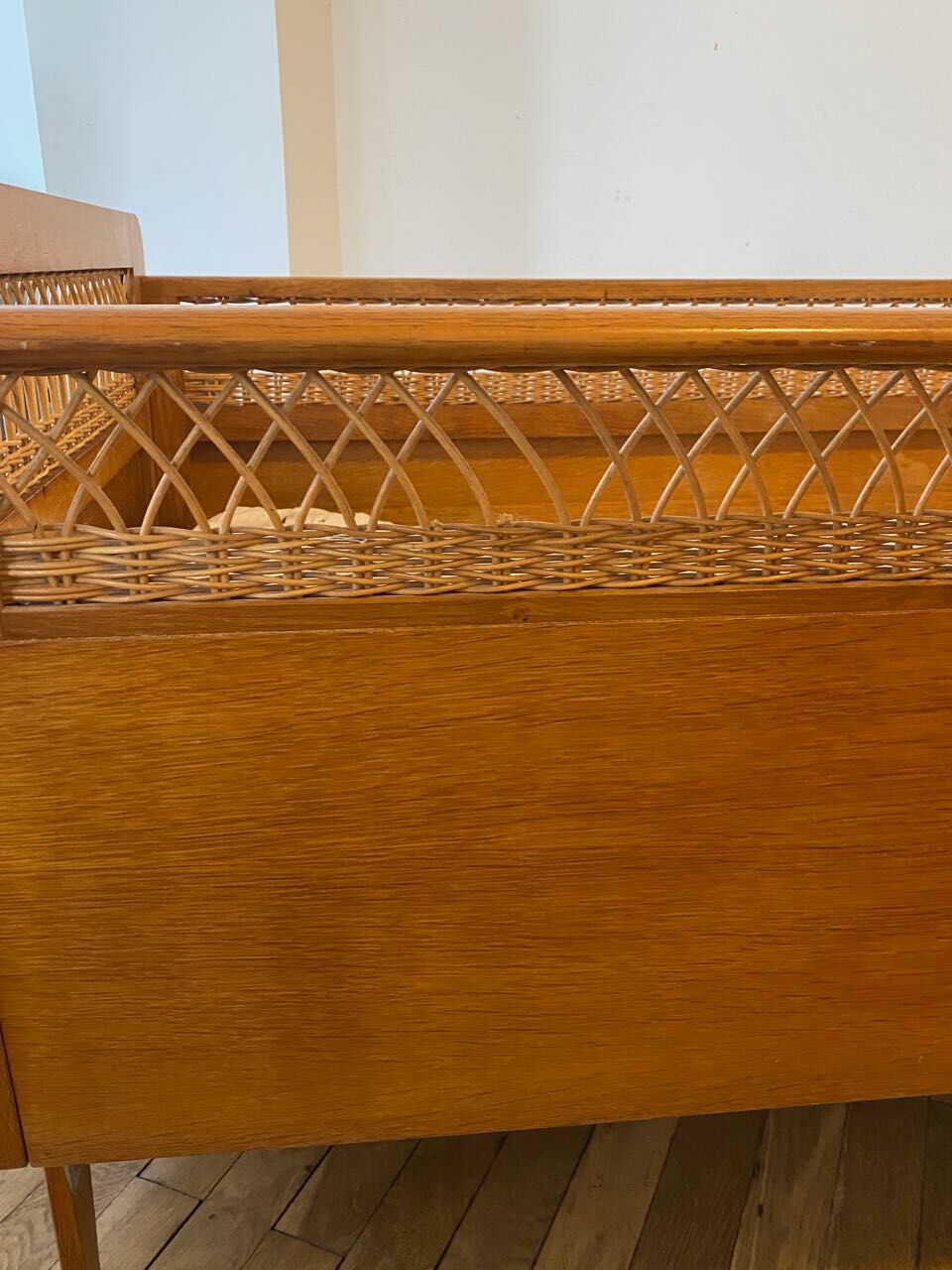 Wooden and wicker baby bed