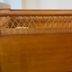 Wooden and wicker baby bed